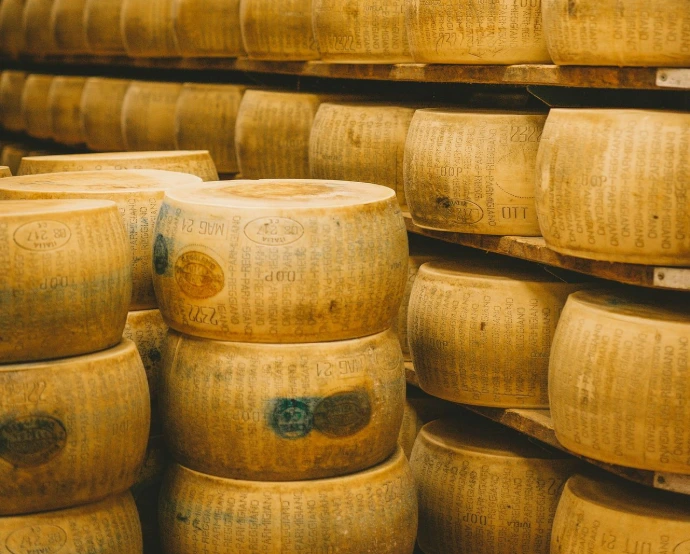 a group of white containers with brown powder on them